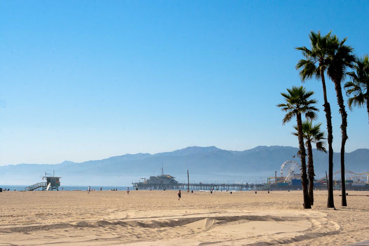Santa Monica beach with the Santa Monica pier in the background.
