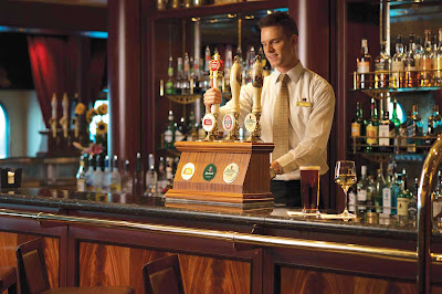 Choose from a wide assortment of brews on tap at the Golden Lion Pub aboard Queen Mary 2.