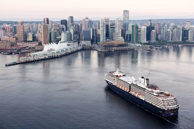 The Vancouver BC cruise ship terminal with  Holland America Line's Zuiderdam cruising into port