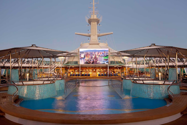 Watch a movie from the pool on  Rhapsody of the Seas' outdoor movie screen.