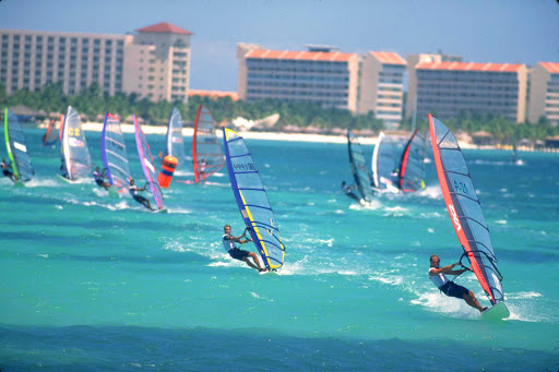 windsurfing-crowd-Aruba - A squadron of windsurfers on Aruba.