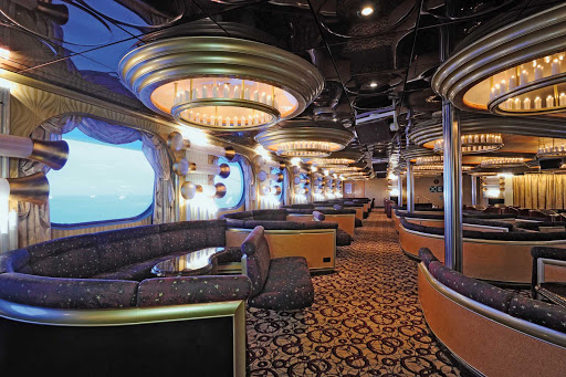 Enjoy a cocktail, karaoke and adult comedy shows at the Candlelight Lounge on Carnival Inspiration.