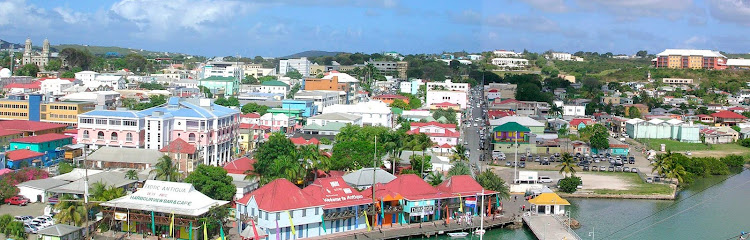 Roger Wollstadt: "A panorama of St. John's, Antigua, which I took from the Holland America cruise ship Maasdam. St. John's Cathedral (Anglican) is at the far left. Mount St. John's Medical Centre is at the far right. The green area left of the medical center is the Botanical Garden."