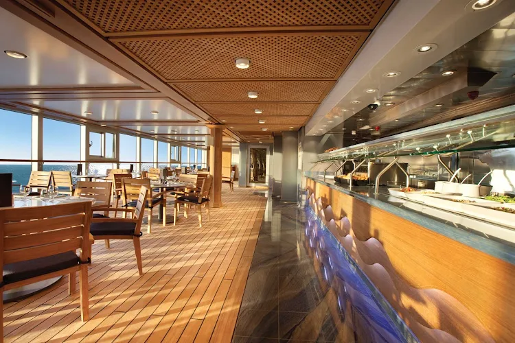 Take a break from lounging in the sun and enjoy an informal meal in the Waves Grill's dining room aboard  Oceania's Riviera.