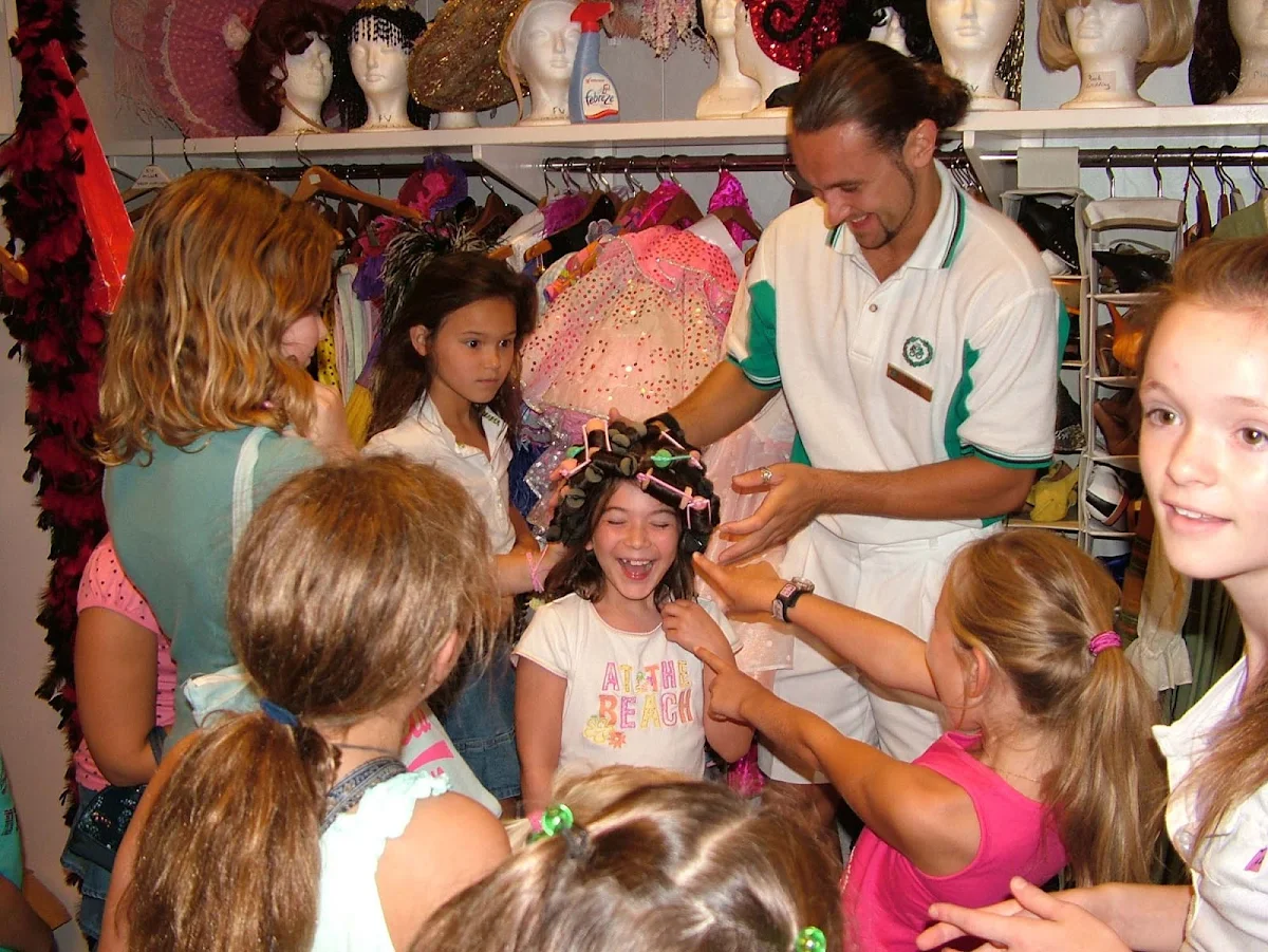 Junior-Cruisers-Dressing-Up-with-Junior-Activities-Director - Kids will have a blast dressing up with other Junior Cruisers activities aboard a Crystal cruise.