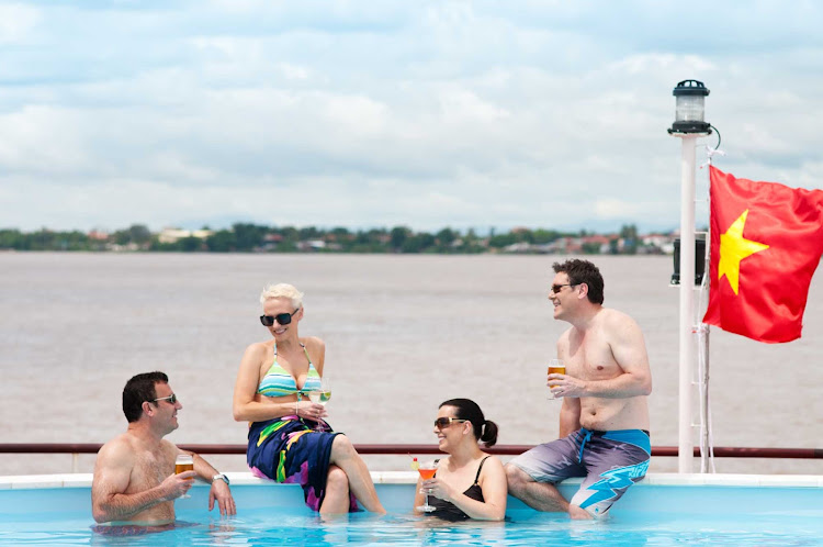 Spend time with new friends and a cocktail while poolside on the AmaLotus sundeck as you sail the Mekong River in Cambodia and Vietnam. 