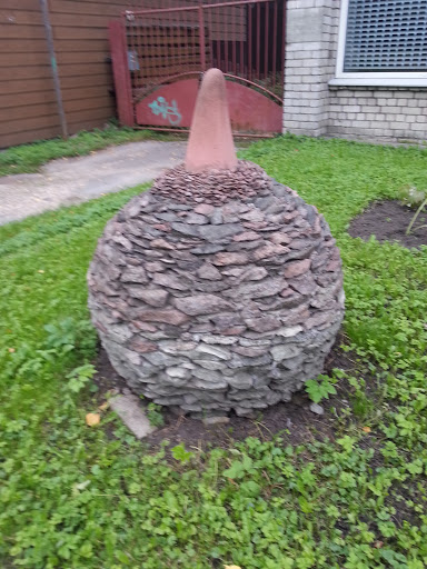 Stone Sculpture with a Hat