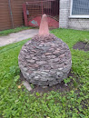 Stone Sculpture with a Hat