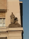 Statues On The Wall