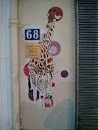 Giraffe on the Wall