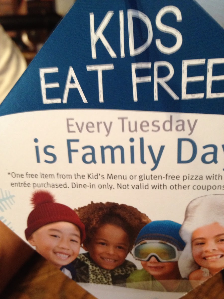 Kids can get a free gluten free pizza with adult purchase on Tuesday.  Great Pizza!