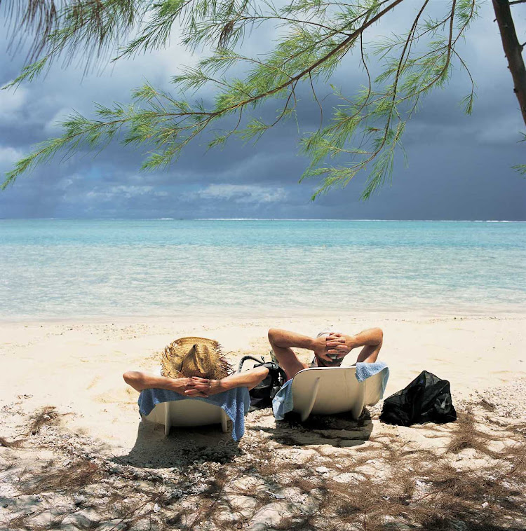Soak up the sun during a day on a tropical beach during your Windstar cruise.