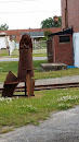 Iron Chair at Railroad Tracks Art