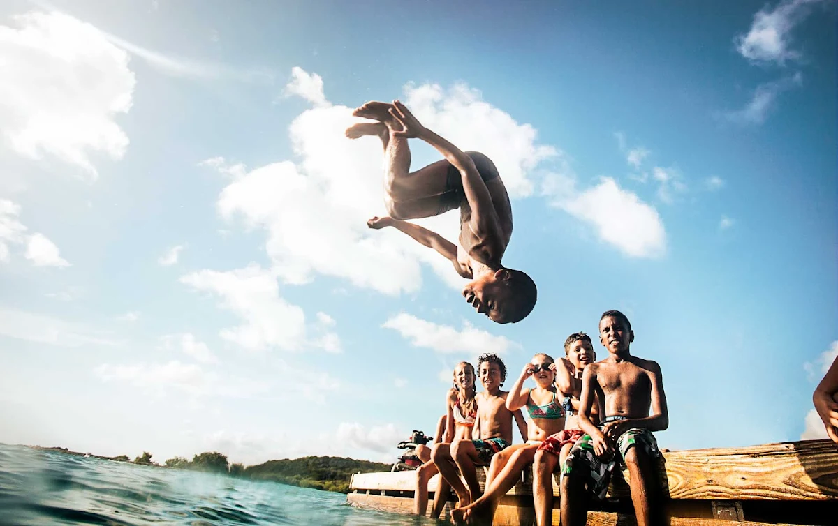 Curacao-dock-kids - There's plenty of fun in the sun, sand and sea for kids in Curacao.