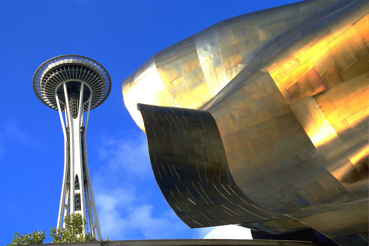 The EMP Museum and Space Needle share space on the Seattle Center grounds.