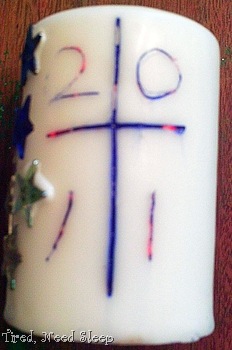 paschal candle  - cross and year