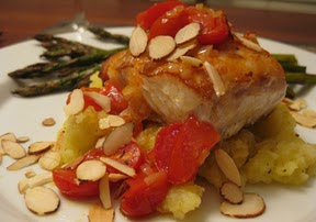Roasted Halibut with Crushed Potatoes, Almonds and Tomatoes