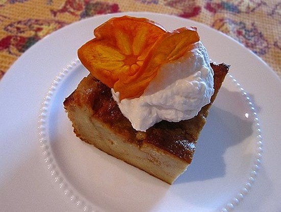 Persimmon Bread Pudding with Whipped Cream and Dried Persimmon Slices
