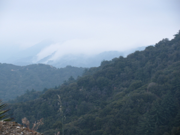 Even more spillage of clouds over the mountains.