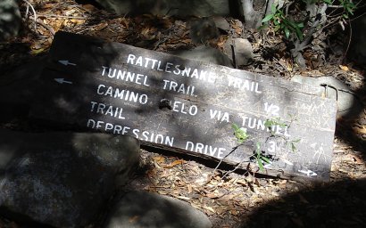 Junction along Rattlesnake Canyon: right 1/2 mile to Depression Drive and left 1/2 a mile to Tunnel Trail or 3 miles to Camino Cielo.