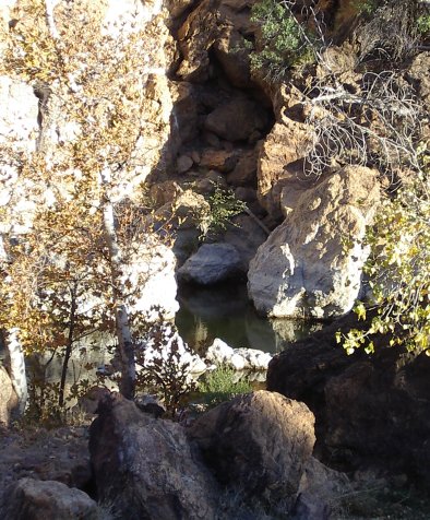 The base of Red Rock and the pool below.