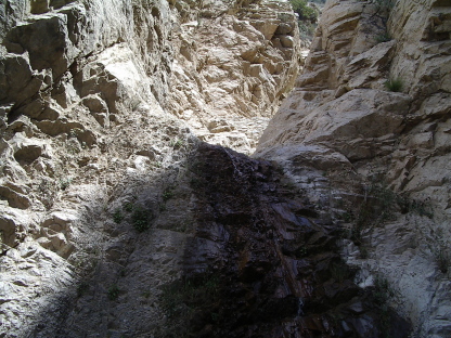 Top of falls and the canyon walls curling in.