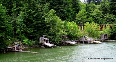 Native American fishing platforms on the Washington bank.  Four Indian tribes have year-round fishing rights in these traditional fishing grounds, where the rapids were flooded as water rose behind the dams.
