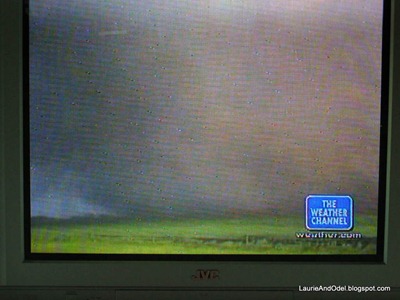 I took this picture of the Weather Channel the next morning, watching the news of the historic tornado outbtreak.