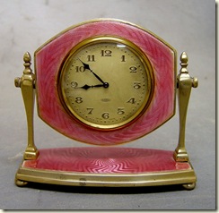 pink gullioche clock on stand