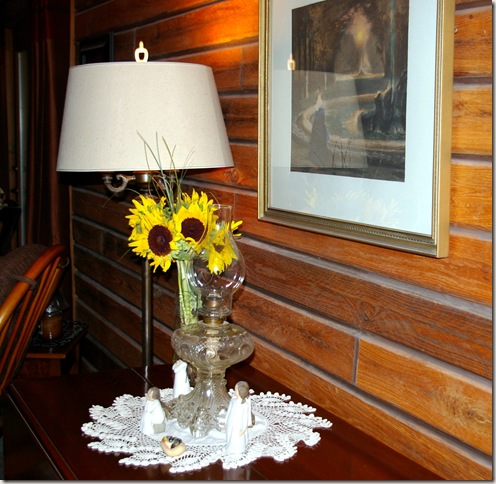 sunflowers with oil lamp