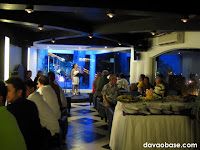 Tap Room showcases a beautiful blue-lit stage (That's fellow blogger Thel Villarta singing).