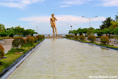 Fish pond in front of the Statue of David at Baywalk along Times Beach shoreline