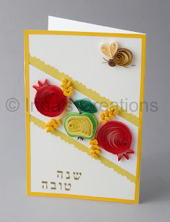 Card with quilled apple, bee, pomegranates and dates