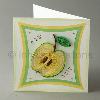 Greeting card with a quilled apple
