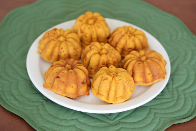 overhead photo of pumpkin mochi cakes on a plate
