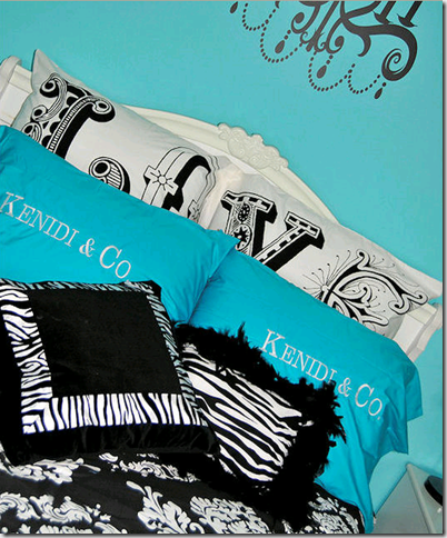 It looks fab in this funky turquoise black and white bedroom designed by 