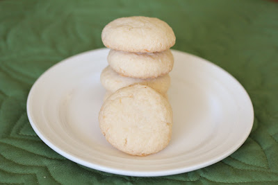 photo of a stack of Coconut Butter Cookies on a plate