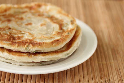 close-up photo of a plate of scallion pancakes