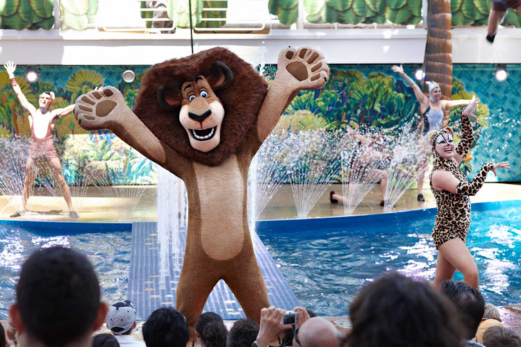 Alex the Lion from the move "Madagascar" interacts with kids and audience members in the outdoor Aqua Theater aboard Oasis of the Seas. 