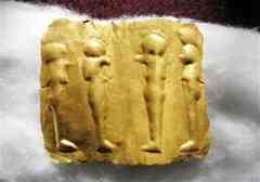 A handout photo released by Egypt's Supreme Council of Antiquities shows a sheet of gold depicting the four sons of Horus, the ancient Egyptian sky god, in Bahariya Oasis, 300 km (190 miles) southwest of Cairo April 12, 2010