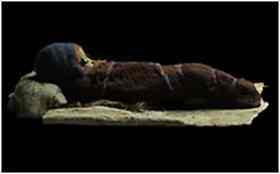 The mummy of an infant was one of about 200 corpses with European features that were excavated from the cemetery
