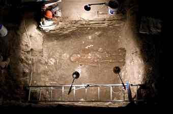 A skeleton is seen from above. The skeleton was found inside a tomb in the ancient city of Chiapa de Corzo, Chiapas, Mexico