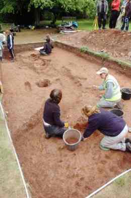 Students from Bristol University excavating Roman postholes 