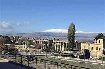 This Nov. 2009 photo shows a snow-capped Lebanese mountain as it forms the backdrop for the Roman ruins at Baalbek. The massive complex of ruins at Baalbek, near the Syrian border, is just 55 miles east of Beirut.