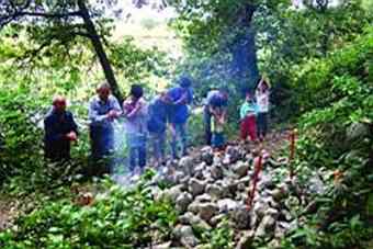 Local residents are paying tribute to these mysterious stone statues.