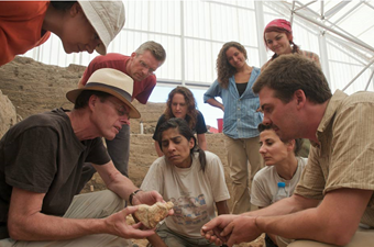 Archaeologist Ian Hodder (left holding figurine) has asked his leading scientific specialists to step down. 