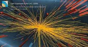 A computed graphic shows the tracks of more than 100 subatomic particles resulting from the collision of protons in the Large Hadron Collider's Compact Muon Solenoid at an energy of 7 trillion electron volts.