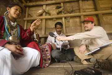 Kachim, a speaker of Koro, talks to National Geographic fellow Gregory Anderson, one of two linguists who announced the discovery of the language, which is used in northeastern India.