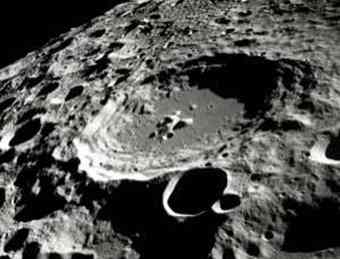 Craters on the moon testify to a period of heavy bombardment by comets and asteroids during the earth's early formation.