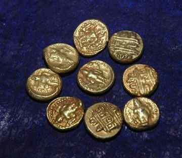 Ancient coins that were seized from residents of Magaral near Kancheepuram on Tuesday. Photo: B. Jothi Ramalingam 
